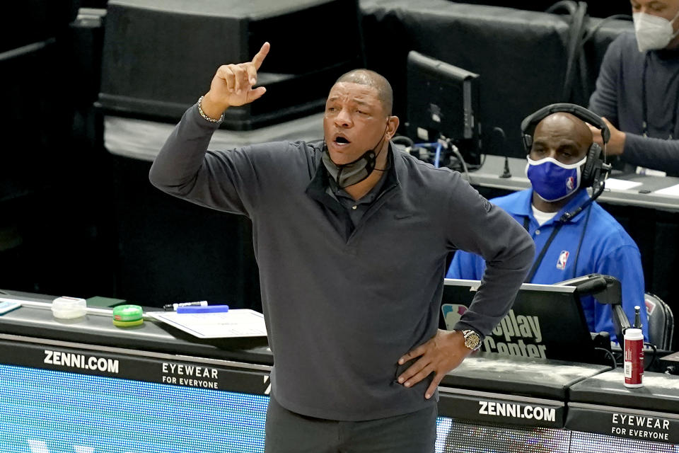 Philadelphia 76ers head coach Doc Rivers directs his team during the second half of an NBA basketball game against the Chicago Bulls Monday, May 3, 2021, in Chicago. (AP Photo/Charles Rex Arbogast)