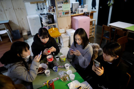 Japanese Yuuka Hasumi, 17, who wants to become a K-pop star, and her friends have lunch after a Korean language class in Seoul, South Korea, March 12, 2019. REUTERS/Kim Hong-Ji