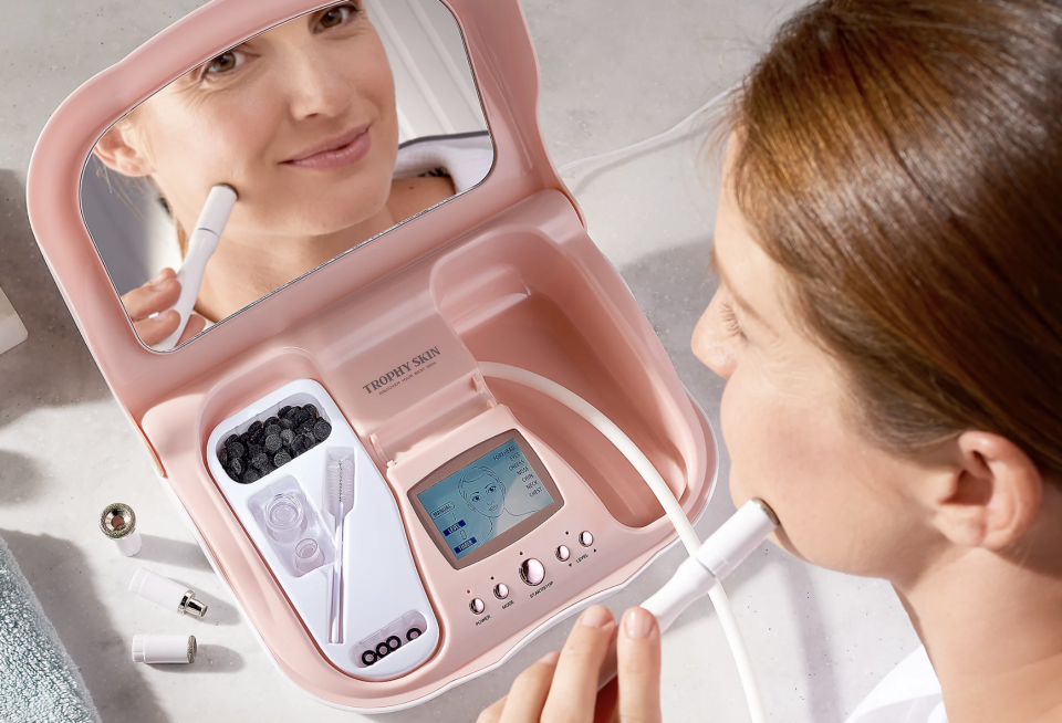 person using microdermabrasion 