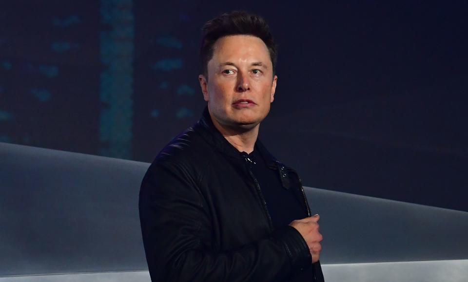 Tesla co-founder and CEO Elon Musk introduces the newly unveiled all-electric battery-powered Tesla Cybertruck at Tesla Design Center in Hawthorne, California on November 21, 2019. (Photo by Frederic J. BROWN / AFP) (Photo by FREDERIC J. BROWN/AFP via Getty Images)