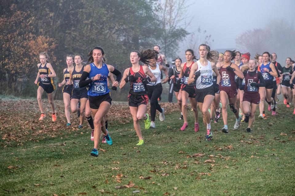 Mason's Meghan Ford (163) and Clara Fletcher (225) are out in front at the start of the D2 Girls Regional Cross Country race Saturday, Oct. 29, 2022. Fletcher went on to win the race with Ford coming in second. 