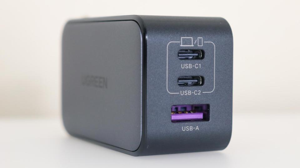 The two USB-C ports and the USB-A port on the front of the UGREEN Nexode 65W Charger