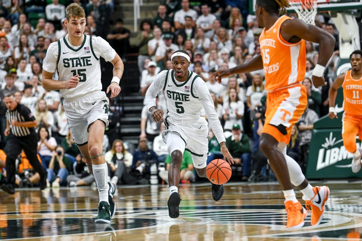 Michigan State's Tre Holloman moves the ball against Tennessee during the first half on Sunday, Oct. 29, 2023, at the Breslin Center in East Lansing.