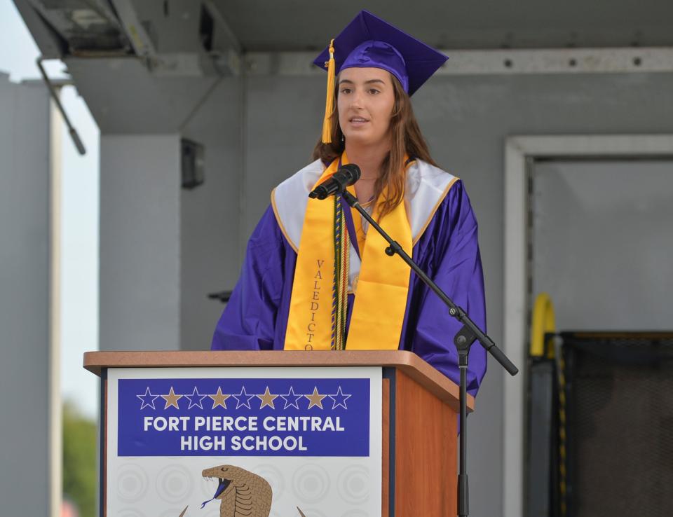 Fort Pierce Central Valedictorian Presley Murray speaks to her classmates during the start of Wednesday's commencement ceremony at Lawnwood Stadium in Fort Pierce.