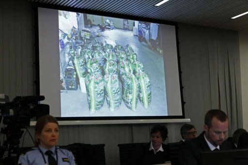 Pictures pertaining to the case of rightwing extremist Anders Behring Breivik, who killed 77 people in twin attacks in Norway last year, are projected at the opening of his trial in Oslo courthouse