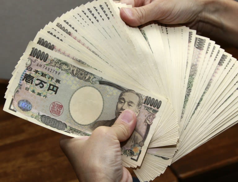 Japan's economy has been beset by ultra-low inflation and the central bank hopes the negative interest rates will encourage more spending and investments