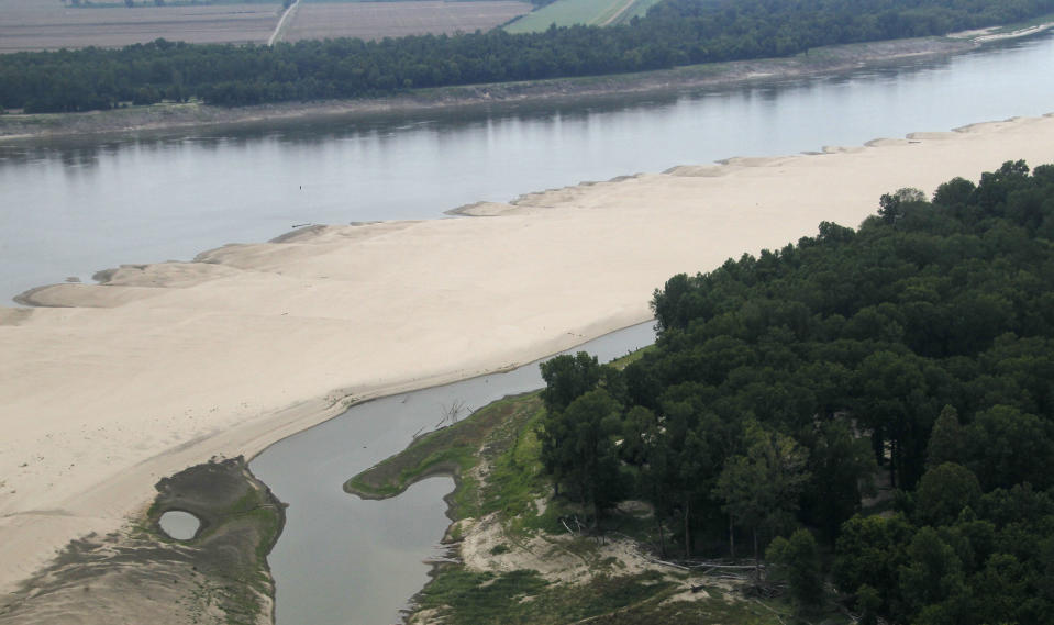 A lowering river allows the sand bars to emerge in the Mississippi River near Greenville, Miss.,Tuesday, Aug. 21, 2012. Officials with the U.S. Army Corps of Engineers say low water levels that are restricting shipping traffic, forcing harbor closures and causing towboats and barges to run aground on the Mississippi River are expected to continue into October. (AP Photo/Rogelio V. Solis)