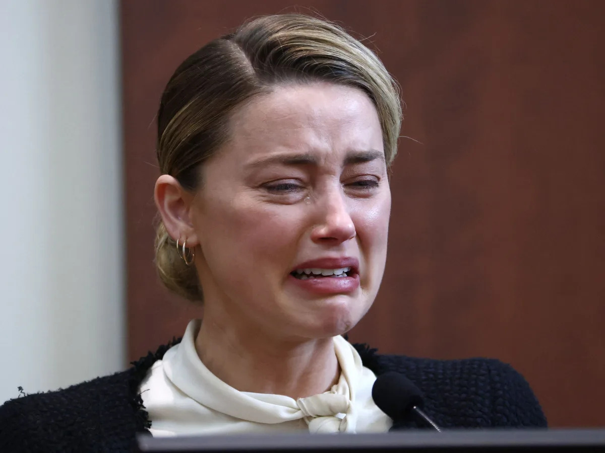 An inconsolable Amber Heard sobbed on the stand as she recalled Johnny Depp pene..