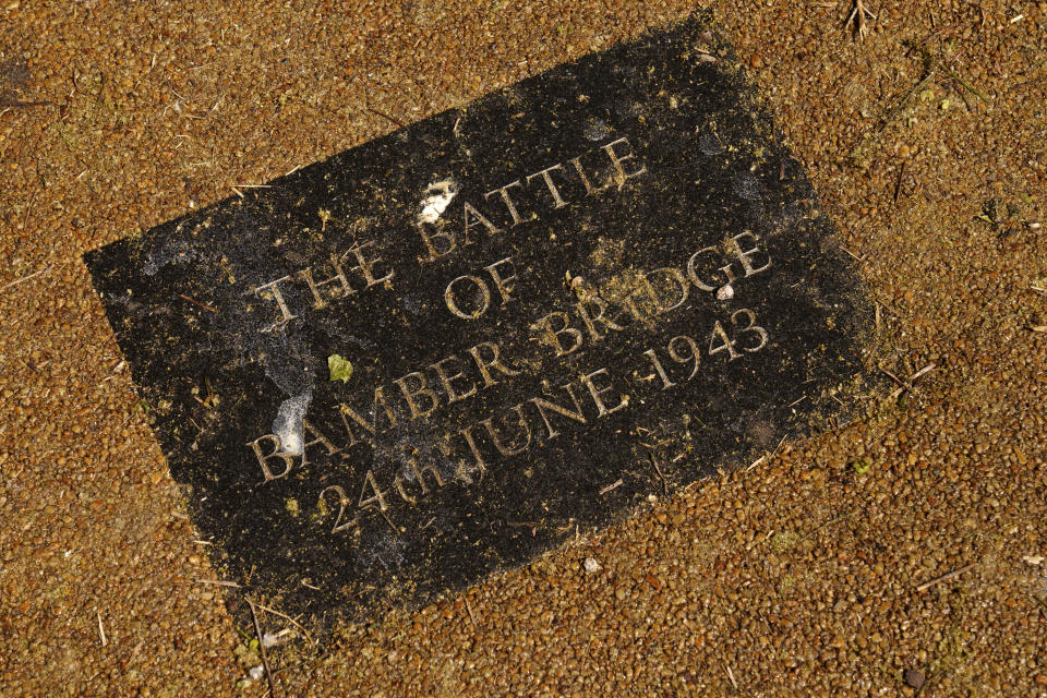 A sign detailing the Battle of Bamber Bridge is seen outside the Ye Olde Hob Inn in Bamber Bridge near Preston, England, Wednesday, June 7, 2023. What is now known as the Battle of Bamber Bridge, erupted there on June 24, 1943 when white military police officers confronted black soldiers enjoying a night off in the local pub. (AP Photo/Jon Super)