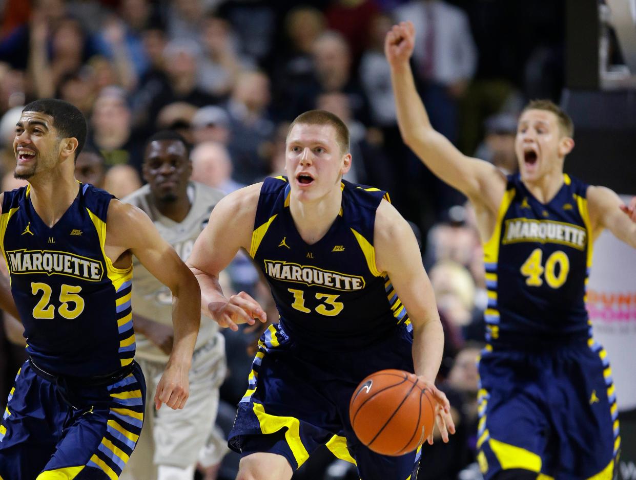 Marquette forward Henry Ellenson (center) in an NCAA college basketball game in Providence, R.I. on Jan. 5, 2016.