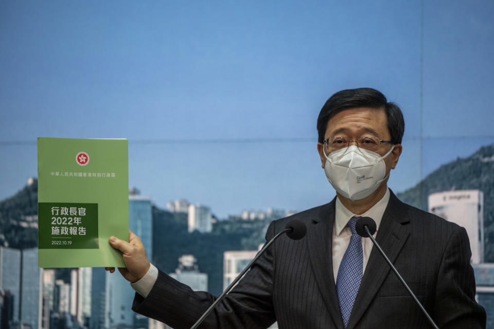 Hong Kong Chief Executive John Lee holding up his Policy Address while speaking at a press conference before his Executive Council Meeting on October 18, 2022 in Hong Kong, China. John Lee will release his first policy address as Chief Executive. (Photo by Vernon Yuen/NurPhoto via Getty Images)
