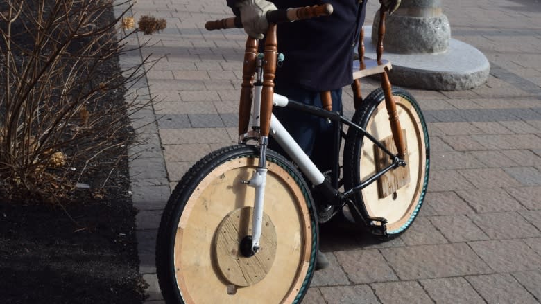 Wooden 'recycle' bike made to say thank you