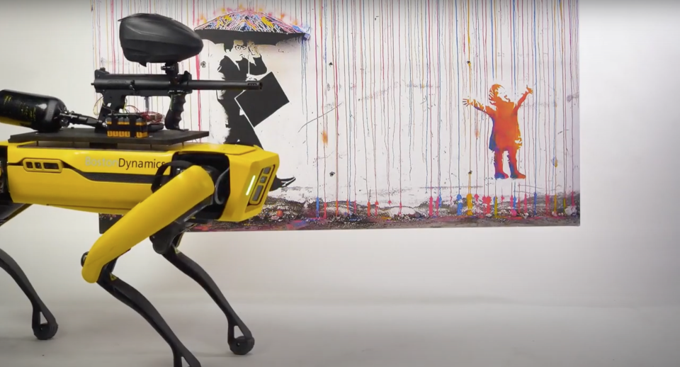 Boston Dynamics' robot Spot standing in front of a painting.