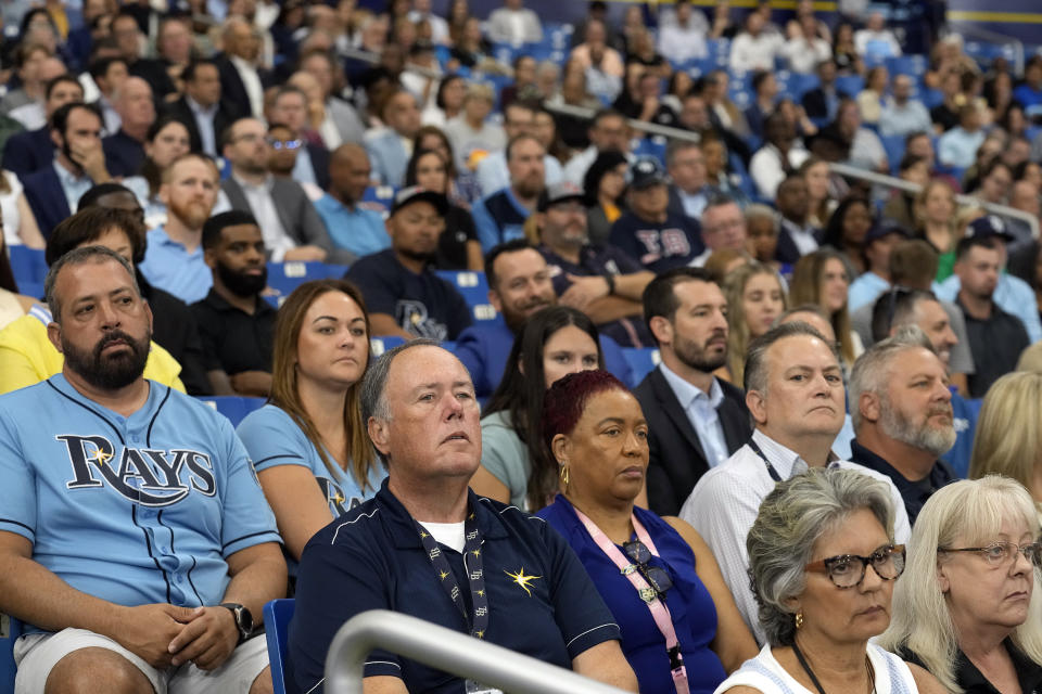 Invited guests look on as the Tampa Bay Rays hold a news conference after the baseball team announced plans for a new stadium Tuesday, Sept. 19, 2023, in St. Petersburg, Fla. (AP Photo/Chris O'Meara)