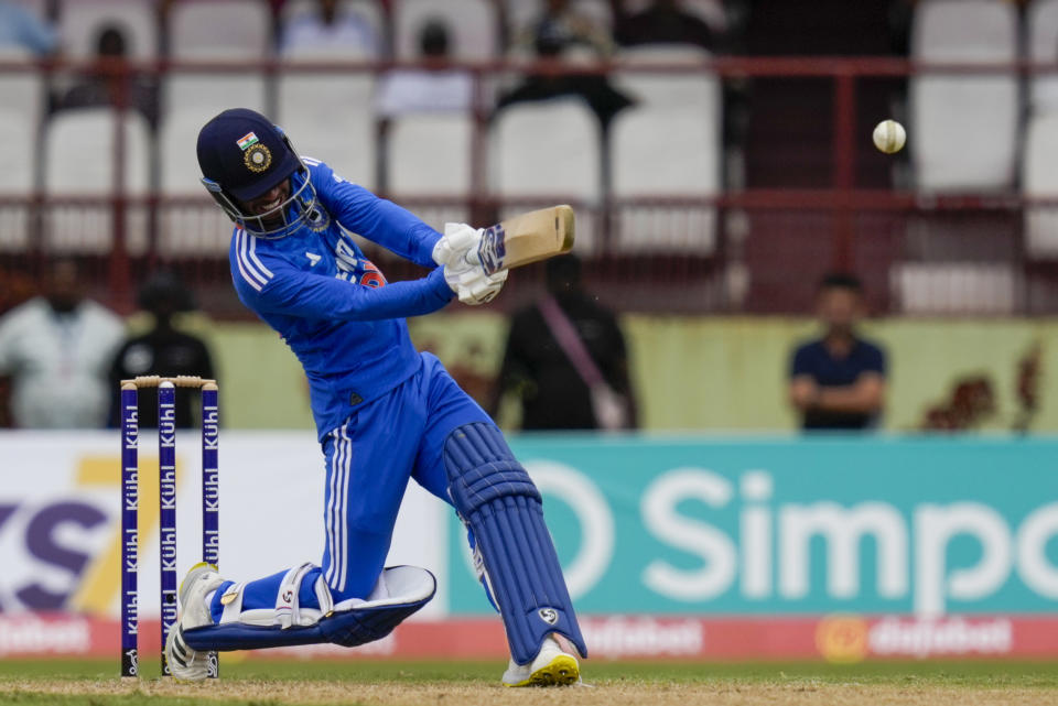 India's Ravi Bishnoi plays a shot against West Indies during their second T20 cricket match at Providence Stadium in Georgetown, Guyana, Sunday, Aug. 6, 2023. (AP Photo/Ramon Espinosa)