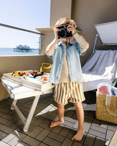 <p>Jessica Sample/Travel + Leisure</p> Elvis Cordero wears Old Navy tops and Rylee & Cru shorts.