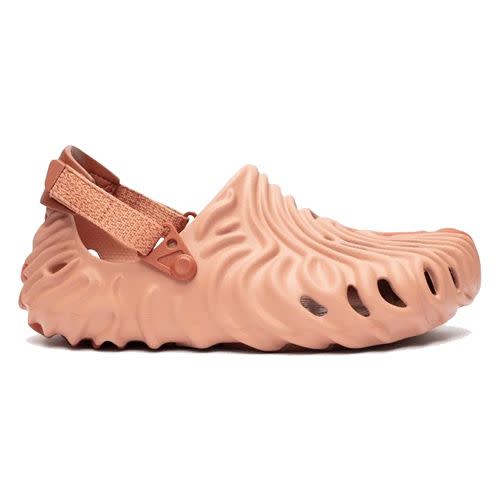 <p><a class="link " href="https://www.sneakersnstuff.com/en-gb/product/59971/crocs-the-pollex-clog-x-salehe-bembury?country_override=GB&dfw_tracker=33235-207393-6RL-11%7Cuk&gclid=EAIaIQobChMI59-4-ZuQ-wIVhpftCh1nmAlYEAQYAyABEgJDZvD_BwE" rel="nofollow noopener" target="_blank" data-ylk="slk:SHOP;elm:context_link;itc:0;sec:content-canvas">SHOP</a></p><p>Inspired by the auburn locks of Danganronpa character Leon Kuwata, this Salehe Bembury x Crocs Pollex Clog is cast in a browny-ginger hue that’s a little less shouty than its predecessors and, therefore, a lot more versatile. </p><p>£69; <a href="https://www.sneakersnstuff.com/en-gb/product/59971/crocs-the-pollex-clog-x-salehe-bembury?country_override=GB&dfw_tracker=33235-207393-6RL-11%7Cuk&gclid=EAIaIQobChMI59-4-ZuQ-wIVhpftCh1nmAlYEAQYAyABEgJDZvD_BwE" rel="nofollow noopener" target="_blank" data-ylk="slk:sneakersnstuff.com;elm:context_link;itc:0;sec:content-canvas" class="link ">sneakersnstuff.com</a></p>