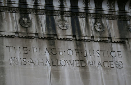 FILE PHOTO: A quote is seen on the side of the U.S. Department of Justice building in Washington, U.S., March 21, 2019. REUTERS/Leah Millis/Files