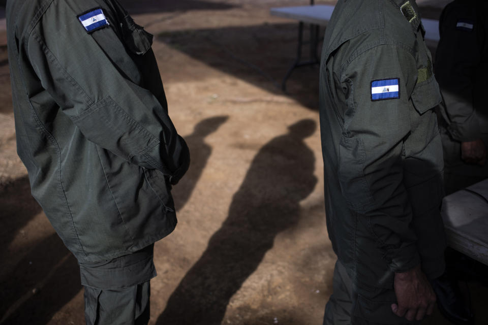 Nicaraguan Army soldiers line up to be verified to vote during municipal elections, in Managua, Nicaragua, Sunday, Nov. 6, 2022. After the Inter-American Commission on Human Rights expressed concern that "the minimum conditions necessary" to hold free and fair elections do not exist in Nicaragua, President Daniel Ortega's Sandinista National Liberation Front is hoping to expand on the 141 of the country's 153 municipalities that it already controls. (AP Photo)