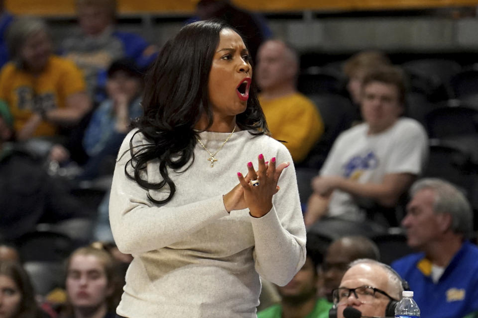 Notre Dame head coach Niele Ivey reacts to a play as her team takes on Pittsburgh during the second half of an NCCA college basketball game in Pittsburgh, Sunday, Feb. 19, 2023. (AP Photo/Matt Freed)