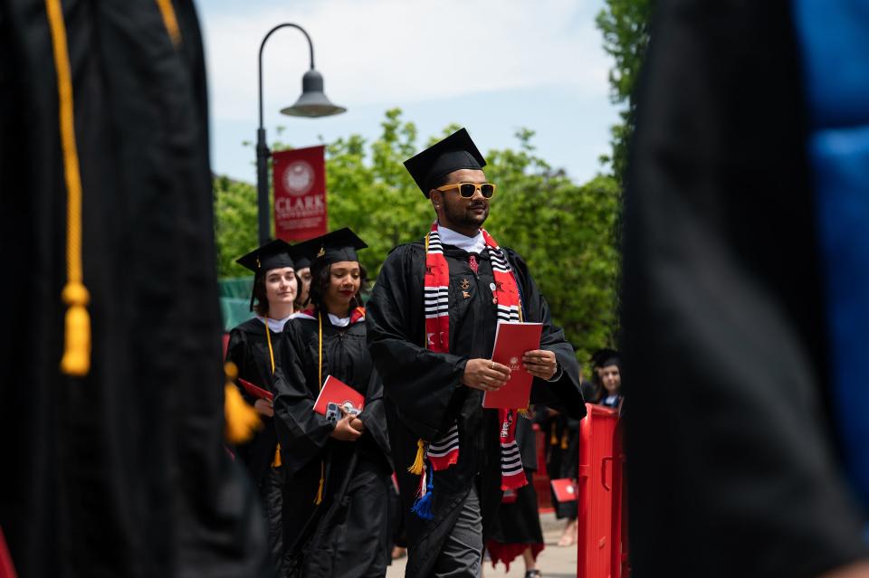 Graduates process during Clark University's 2023 commencement ceremony Sunday.