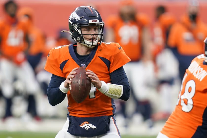 Denver Broncos quarterback Brett Rypien throws a pass during the second half of an NFL football game against the Tampa Bay Buccaneers, Sunday, Sept. 27, 2020, in Denver. (AP Photo/David Zalubowski)