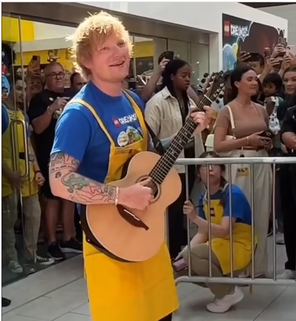 Sheeran, seen here performing at the Lego store recently, has been doing impromptu performances to promote Autumn Variations (Instagram)