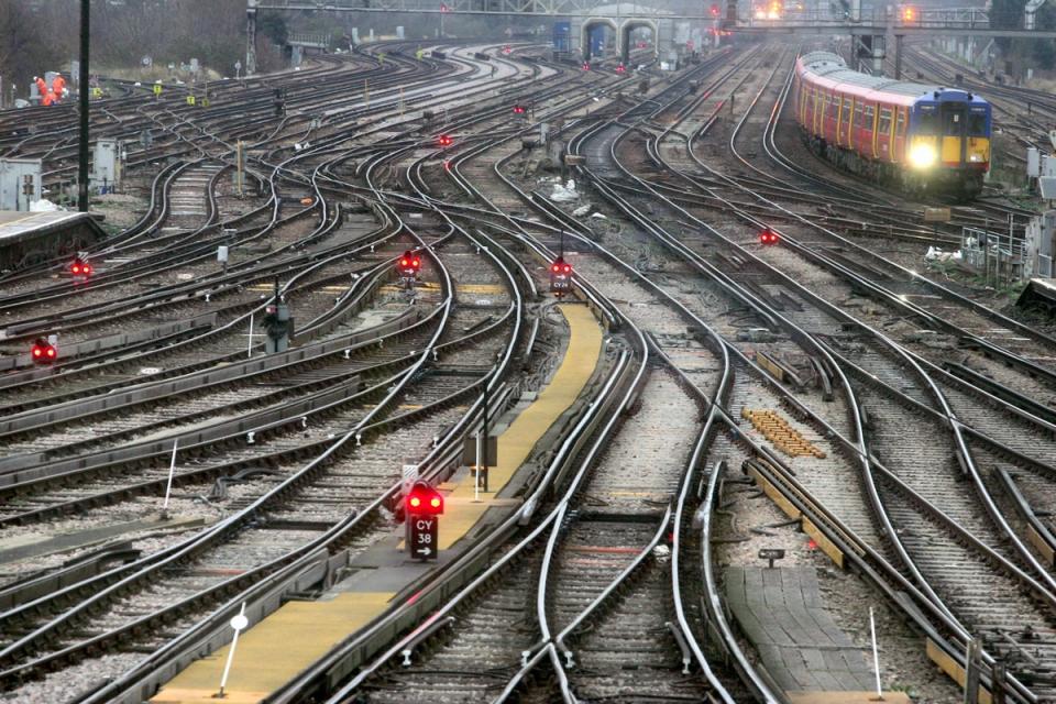 An aerial view of a train pulling in to Clapham Junction in south-west London (Cathal McNaughton/PA) (PA Archive)