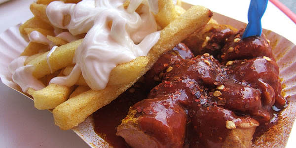 <b>Currywurst, Germany</b> Need something to soak up the German beer? Grab a plate of chopped pork sausage drowning in a thick, spiced tomato sauce dusted with curry powder from a street vendor anywhere.