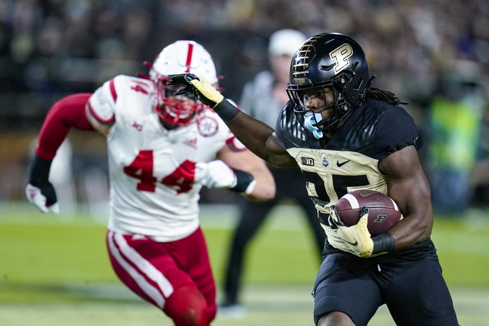 Purdue running back Kobe Lewis (25) runs against Nebraska during the first half of an NCAA college football game in West Lafayette, Ind., Saturday, Oct. 15, 2022. (AP Photo/Michael Conroy)