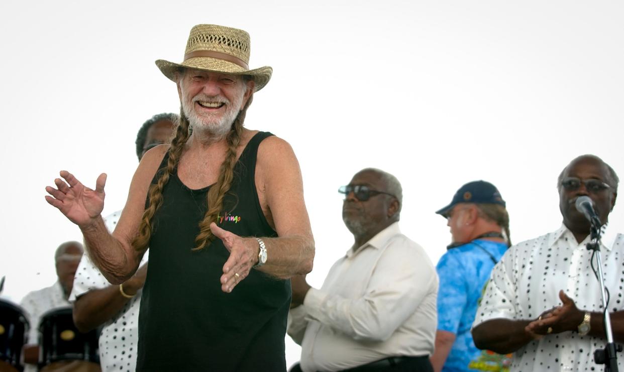 Willie Nelson sings with Bells of Joy at Willie Nelson’s Fourth of July Picnic at Two River Canyon Amphitheatre in Spicewood on Friday July 4, 2003.