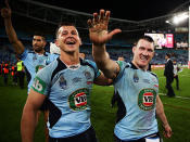 <p>Paul Gallen and Greg Bird salute the Blues fans.</p>