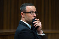 Oscar Pistorius, gestures, as he listens to psychiatric evidence for his defense, during his ongoing murder trial in Pretoria, South Africa, Tuesday, May 13, 2014. The chief prosecutor in the murder trial of Oscar Pistorius has asked that the double-amputee runner be placed under psychiatric evaluation after an expert witness testified that he had an anxiety disorder. Pistorius is charged with the shooting death of his girlfriend Reeva Steenkamp on Valentine's Day in 2013. (AP Photo/Daniel Born, Pool)