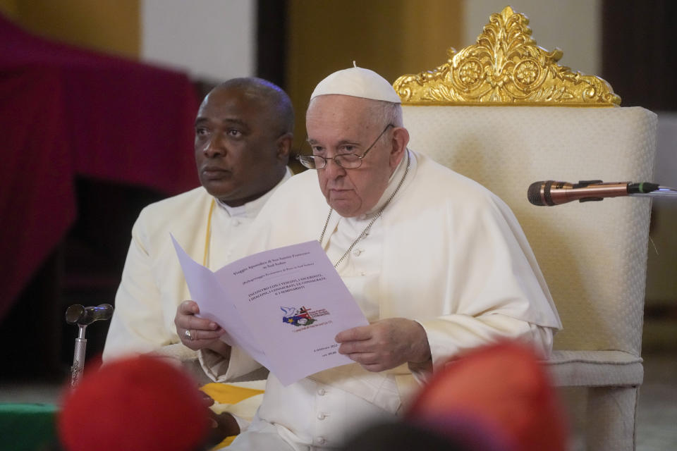 Pope Francis delivers his speech as he meets with priests, deacons, consecrated people and seminarians at the Cathedral of Saint Theresa in Juba, South Sudan, Saturday, Feb. 4, 2023. Francis is in South Sudan on the second leg of a six-day trip that started in Congo, hoping to bring comfort and encouragement to two countries that have been riven by poverty, conflicts and what he calls a "colonialist mentality" that has exploited Africa for centuries. (AP Photo/Gregorio Borgia)