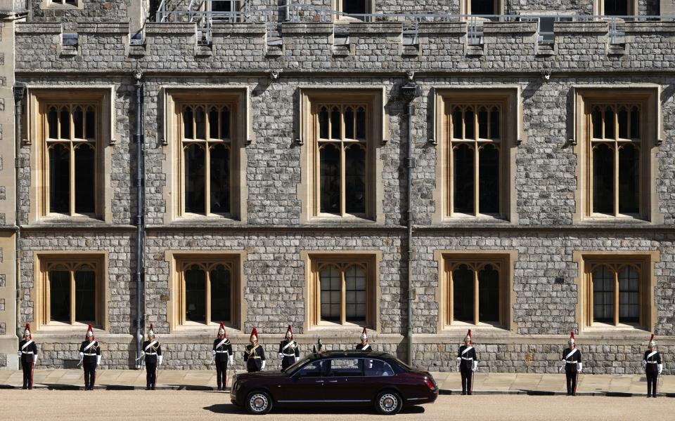 Queen Elizabeth II and Lady Susan Hussey drive through the Quadrangle ahead of the funeral of the Duke of Edinburgh - Adrian Dennis/PA Wire