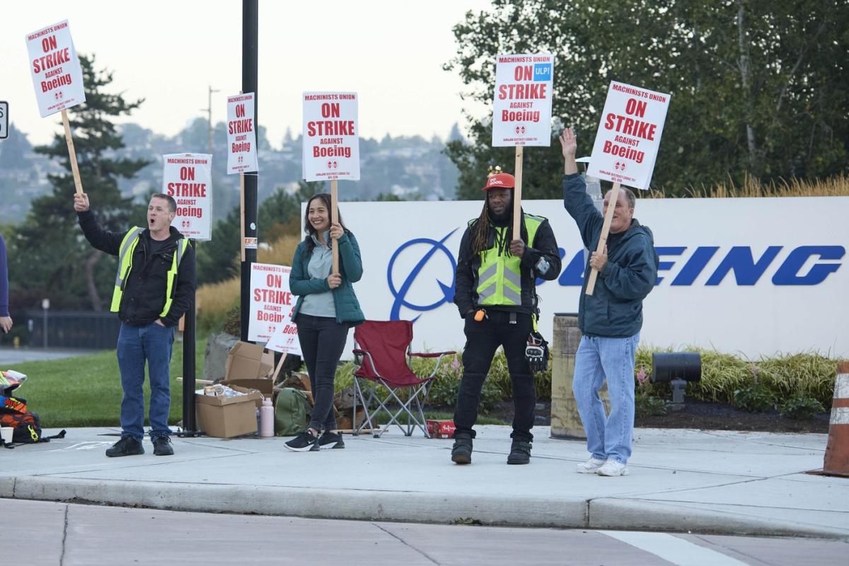 Boeing works to conserve cash as 33,000 factory workers go on strike