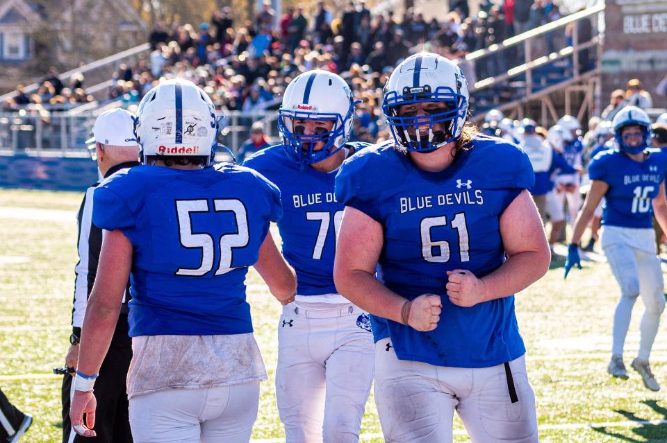 Fairhaven's Kevin Moura is fired up with the goal line stop for the Blue Devils.