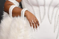<p> The "dripping" crystal nails are not for every occasion (like, any occasion where you might need to type on a computer, for example), but when it's all part of a white and silvery aesthetic, it can be a truly standout look. Picking the right accessories and jewelry to match is key. </p>