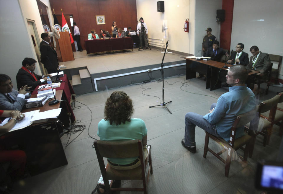 FILE - Joran van der Sloot, front right, sits in court for the continuation of his murder trial at San Pedro prison in Lima, Peru Jan. 11, 2012. In 2012, Van der Sloot was sentenced to 28 years in prison for the Flores killing. (AP Photo/Karel Navarro, File)