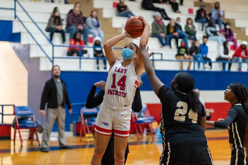 Ellender girls basketball player Jasi Jenkins (14) plays against Salmen in a Class 4A first-round playoff game in Houma on Feb. 18.