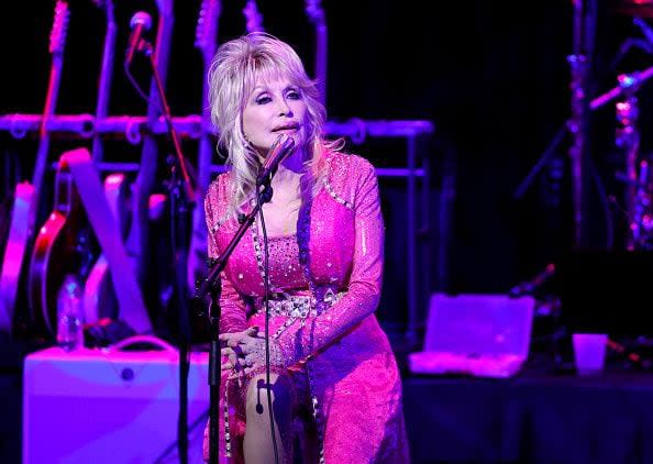 Dolly Parton performs at the 2021 Kiss Breast Cancer Goodbye Concert at CMA Theater at the Country Music Hall of Fame and Museum on October 24, 2021 in Nashville, Tennessee. (Photo by Jason Kempin/Getty Images)