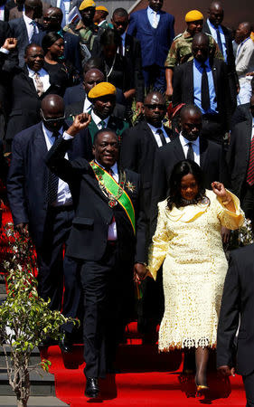 Zimbabwe's President Elect Emmerson Mnangagwa and his wife Auxillia arrive to officiate at the national 38th Heroes Day Commemorations at the Heroes Acre in Harare, Zimbabwe, August 13, 2018.REUTERS/Philimon Bulawayo