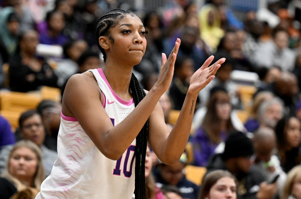 LSU's Angel Reese supports her team during a game against Coppin State on Dec. 20, 2023 in Baltimore. (Photo by G Fiume/Getty Images)