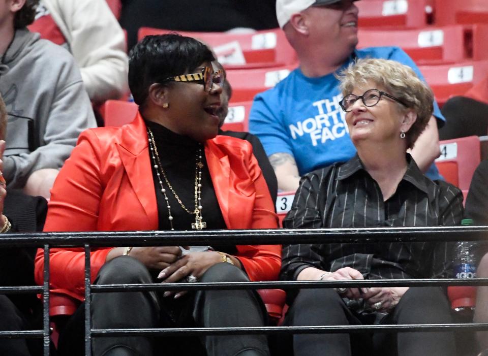 Texas Tech alumna Sheryl Swoopes, left, and former Texas Tech women's basketball coach Marsha Sharp laugh together during the Texas Tech game against Baylor, Saturday, Jan. 28, 2023, at United Supermarkets Arena.