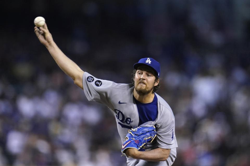 Los Angeles Dodgers starting pitcher Trevor Bauer throws against the Arizona Diamondbacks.