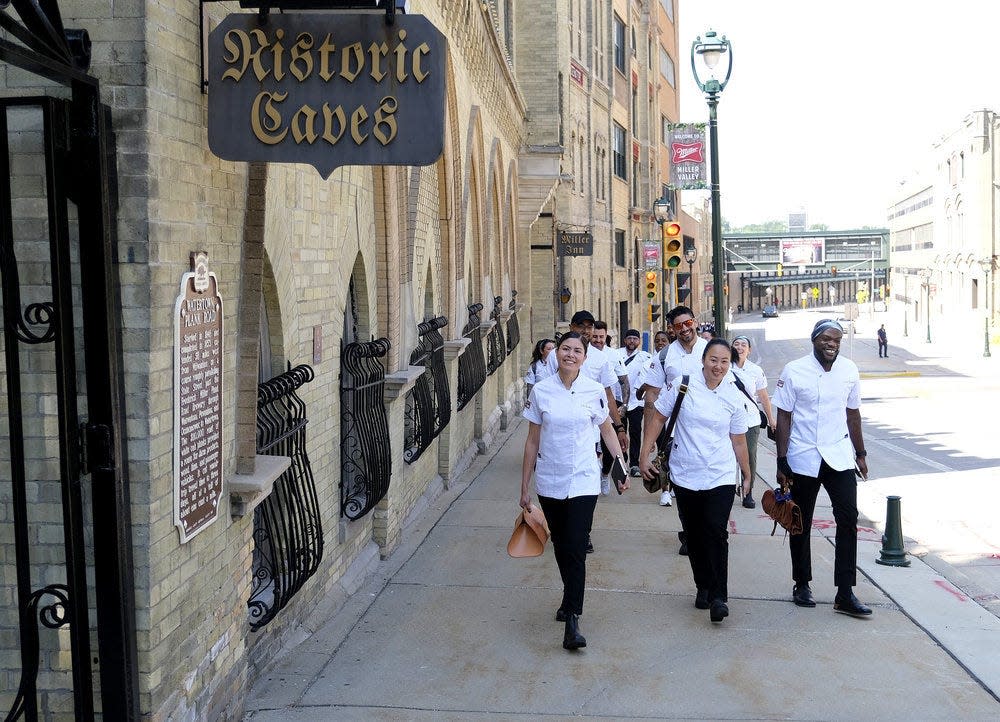 "Top Chef: Wisconsin" cheftestants approach the Historic Miller Caves, where they served a seven-course menu made with bar snacks to a table of 10 judges.