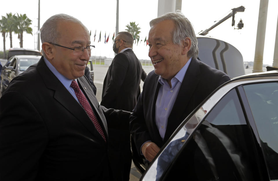 Algerian Foreign Minister Ramtane Lamamra receives United Nations Secretary General António Guterres as he arrives to participate in the Arab Summit as a guest of honor, in Algiers, Algeria, Tuesday, Nov. 1, 2022. Algeria is readying to host the 31st summit of the largest annual Arab conference on Tuesday and Wednesday, as the region battles to find common ground over a series of divisive issues. (AP Photo/Toufik Doudou)