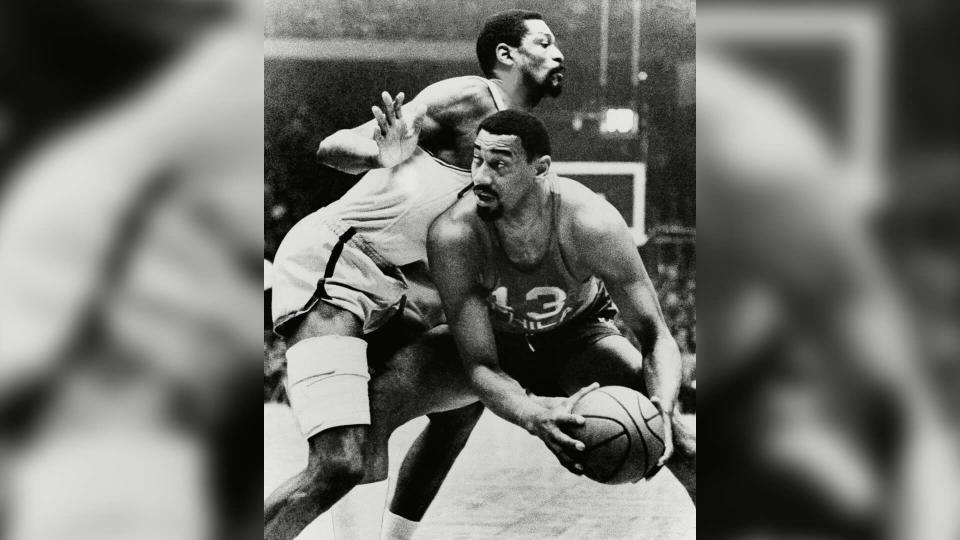 Mandatory Credit: Photo by AP/Shutterstock (7328231a)Boston Celtics Bill Russell and Wilt Chamberlain of the Philadelphia 76ers in playoff actionCeltice 76ers Basketball.