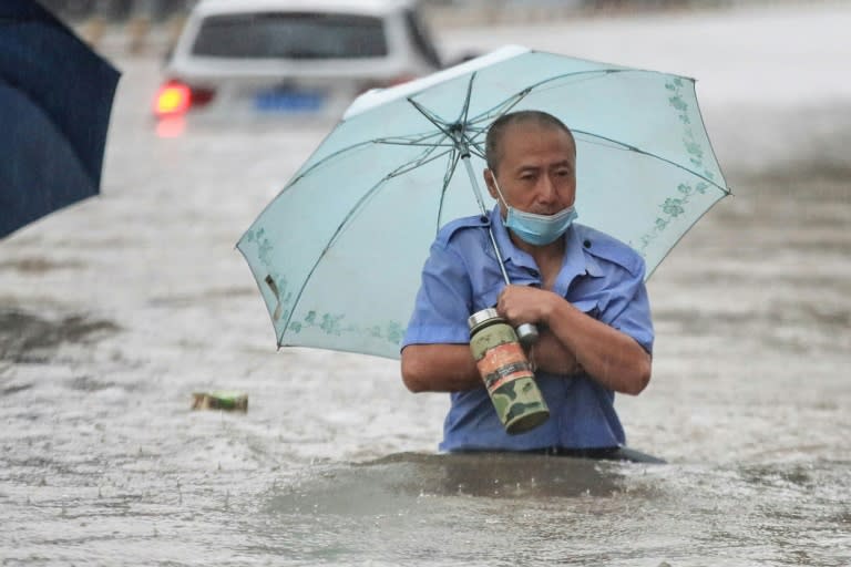 Record rainfall flooded the city of Zhengzhou, killing 12 people and submerging the subway system