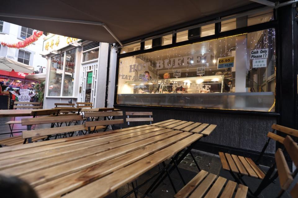 Empty tables and chairs outside a restaurant in Soho, central London, on December 29 (James Manning/PA) (PA Wire)